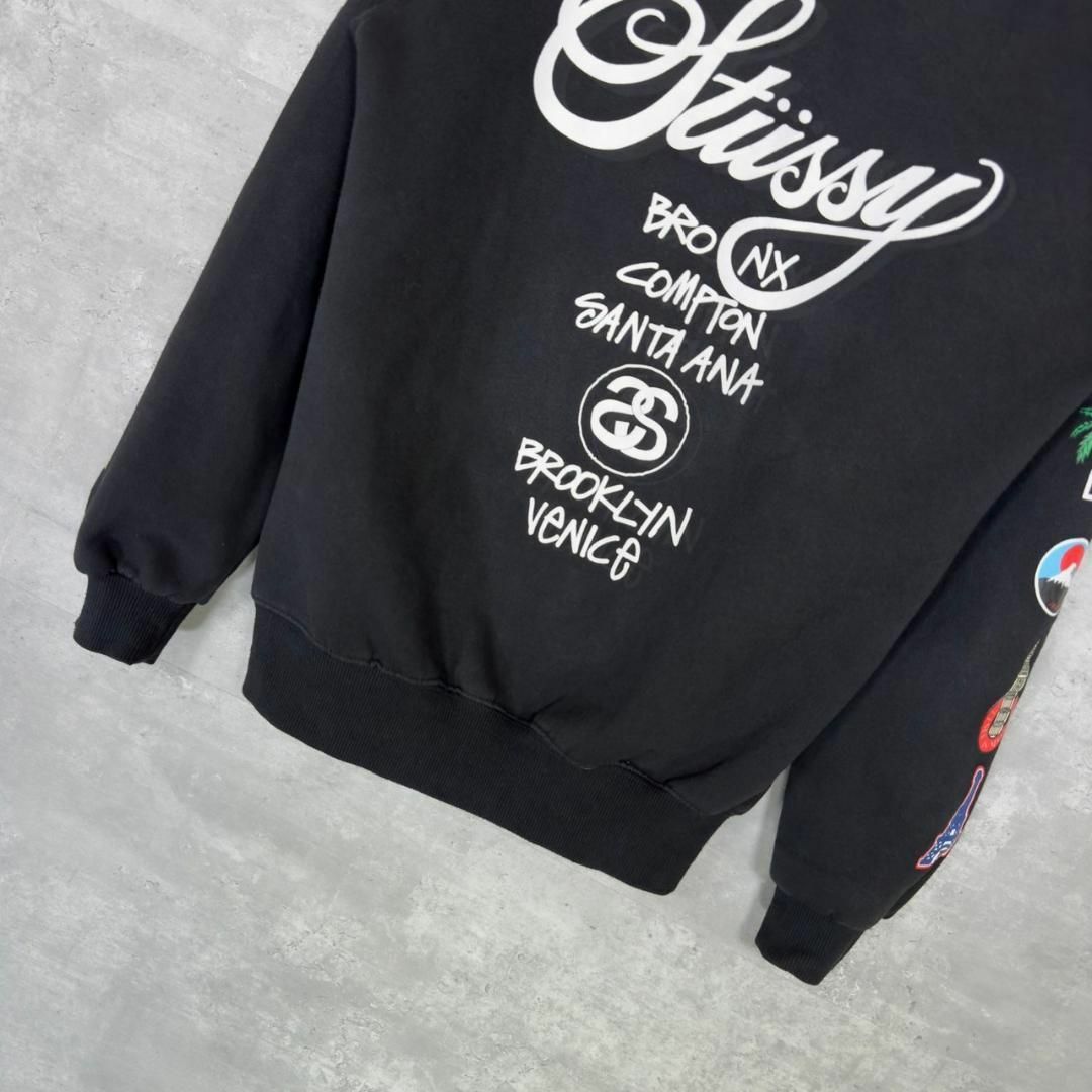 『STUSSY』ステューシー (M) ワールドツアー プリントパーカー