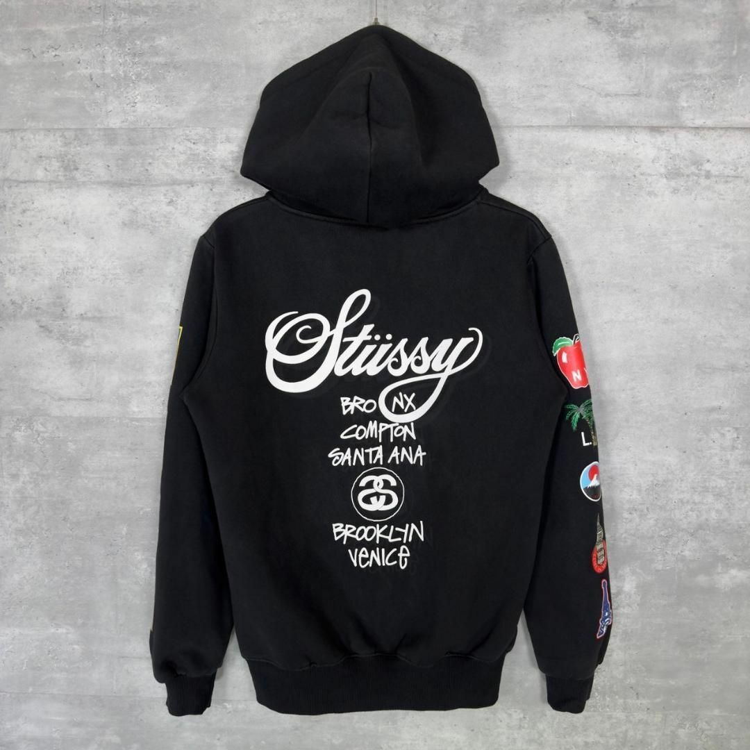『STUSSY』ステューシー (M) ワールドツアー プリントパーカー