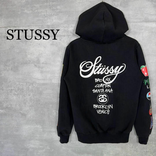 『STUSSY』ステューシー (M) ワールドツアー プリントパーカー